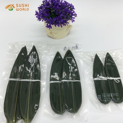 진공 포장 된 신선 한 대나무 잎 부분 잎 으로 입 을 찌르는 쌀 덩굴 을 만들 것